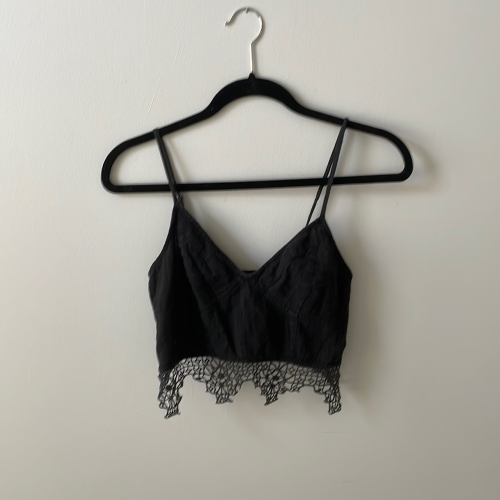 Free people crop top in black. Size small.